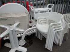 A suite of UPVC garden furniture including lounger, tea trolley, table and chairs