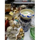 A parcel of mixed pottery including English pottery cottages, cruet set etc