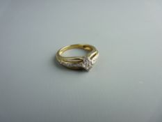 A NINE CARAT GOLD DIAMOND CLUSTER RING having a centre diamond shaped cluster of four tiny