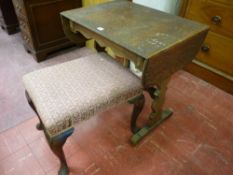 A VINTAGE STOOL and an oak twin flap side table, 45 cms and 70 cms high respectively