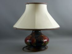 A MOORCROFT 'BIRDS & FRUIT' LARGE BULBOUS SQUAT FORM TABLE LAMP, with Moorcroft lampshade, 29 cms