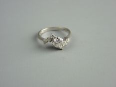 AN EIGHTEEN CARAT WHITE GOLD DIAMOND SOLITAIRE RING, visual estimate 0.8 carat with six tiny