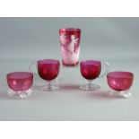FIVE PIECES OF VICTORIAN CRANBERRY GLASS to include a Mary Gregory beaker having 'Dear Cook'