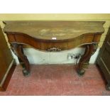 A VICTORIAN MAHOGANY HALL CONSOLE TABLE having a shaped top over a single central frieze drawer on