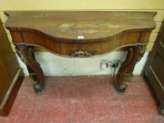 A VICTORIAN MAHOGANY HALL CONSOLE TABLE having a shaped top over a single central frieze drawer on