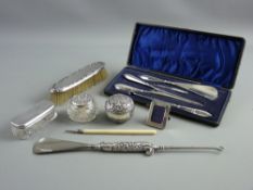 A SMALL PARCEL OF NON-MATCHING MAINLY DRESSING TABLE SILVER ITEMS and a four piece silver handled