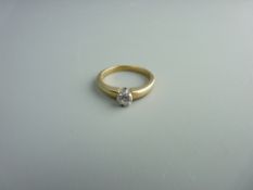 A NINE CARAT GOLD DIAMOND SOLITAIRE RING with round cut diamond, visual estimate 0.25 carat, 3