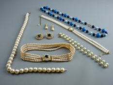 A QUADRUPLE PEARL NECKLACE, a twin strand pearl necklace and another