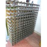 A VINTAGE ONE HUNDRED & EIGHTY BOTTLE FLOORSTANDING WINE RACK, 143 cms high, 122 cms wide, 25 cms