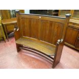 A NEAT VICTORIAN CURVED BACK PITCH PINE PEW, 124 cms high, 140 cms wide maximum