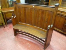 A NEAT VICTORIAN CURVED BACK PITCH PINE PEW, 124 cms high, 140 cms wide maximum