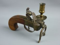 A FLINTLOCK TINDER PISTOL TABLE LIGHTER with candle sconce, 13.5 cms long, no visible markings but