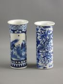 TWO CHINESE PORCELAIN SLEEVE VASES, blue and white decorated with prunus blossom and panels of