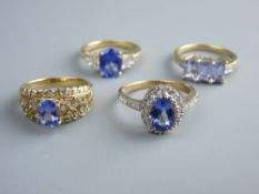 AN EIGHTEEN CARAT GOLD TANZANITE DRESS RING and three nine carat gold tanzanite rings (two oval