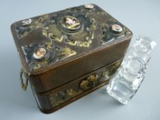 A VICTORIAN SCENT BOTTLE BOX, brown leather covered with Gothic style gilt metal mounts and carry