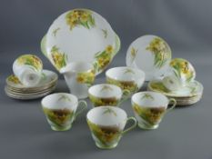 A TWENTY ONE PIECE SHELLEY 'DAFFODIL TIME' BONE CHINA TEASET comprising six cups, saucers and side