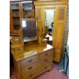 TWO ITEMS OF EARLY 20th CENTURY BEDROOM FURNITURE including a satin pine wardrobe with single