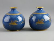 A PAIR OF WILTON WARE VASES, globular squat form with gilt rim interiors, lace collar and