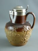 A 19th SALT GLAZED TAVERN JUG with silver collar and lid, London hallmarks for 1870, maker's mark '