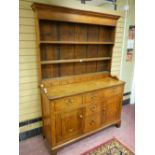 A COUNTRY OAK & PINE FARMHOUSE DRESSER, the three shelf wide boarded rack with blind spice drawers