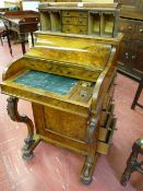 A VICTORIAN BURR WALNUT PIANO TOP DAVENPORT with pop-up stationery compartment, the interior with