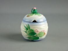 A CLARICE CLIFF 'WATER LILY' NEWPORT POTTERY JAM POT & COVER, no. 987, 11 cms high