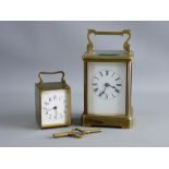 TWO FRENCH BRASS CASED CARRIAGE CLOCKS, the larger with white enamel dial set with Roman numerals,