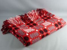 A RED GROUND TRADITIONAL WELSH WOOLLEN BLANKET, 232 x 160 cms