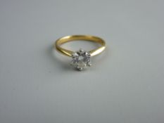AN EIGHTEEN CARAT GOLD DIAMOND SOLITAIRE RING, visual estimate 0.8 carat, 3.2 grms total, size O/P