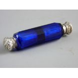 A BRISTOL BLUE GLASS DOUBLE ENDED SCENT BOTTLE, facet cut with white metal hinged and screw-off