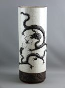 A CHINESE CRACKLE GLAZE CYLINDRICAL STICKSTAND, the white body with two, four toed dragons in relief