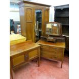 AN EDWARDIAN INLAID MAHOGANY THREE PIECE BEDROOM SUITE of single mirrored wardrobe with base drawer,