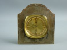 A SILVER MOUNTED BEDSIDE ALARM CLOCK, the gilt brass framed clock with baton markers, the dial