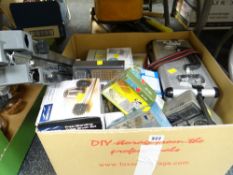 A box of boxed household small electricals and battery operated devices