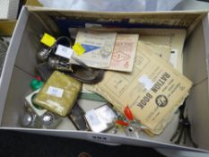 A shoebox and contents including Russian books and ephemera, small collectables including a silver