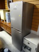 A Montpellier silver upright fridge freezer