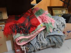A parcel of blankets including a good traditional Welsh chequered pink and green woollen example