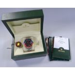 A ROLEX OYSTER PERPETUAL DATE GMT-MASTER II SUPERLATIVE CHRONOMETER with chrome bracelet, graphite d