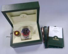 A ROLEX OYSTER PERPETUAL DATE GMT-MASTER II SUPERLATIVE CHRONOMETER with chrome bracelet, graphite d