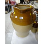 An excellent stoneware farmhouse dairy jug with twin-handles and in two-tone glaze