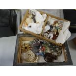 A pewter jewellery box and contents including yellow metal wedding band etc