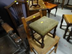 An antique wooden farmhouse chair, an antique pine chair and a stool
