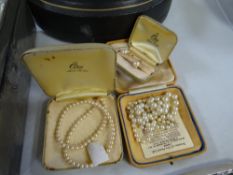 Three separate items of pearl jewellery