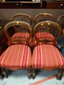 A set of Victorian balloon back chairs with striped upholstered seats