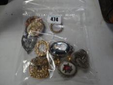 A parcel of costume brooches