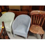 A vintage elm wood chair and a pair of loom chairs