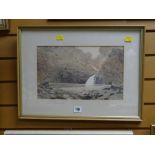 A framed watercolour of a waterfall in Snowdonia by Conwy artist Jeremy Yates