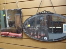 Two vintage unframed bevelled wall mirrors
