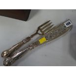 A pair of hallmarked silver fish servers with blade and handle in silver