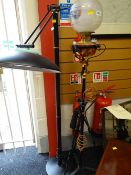 An antique Duplex of England standard oil lamp together with a modern standard lamp